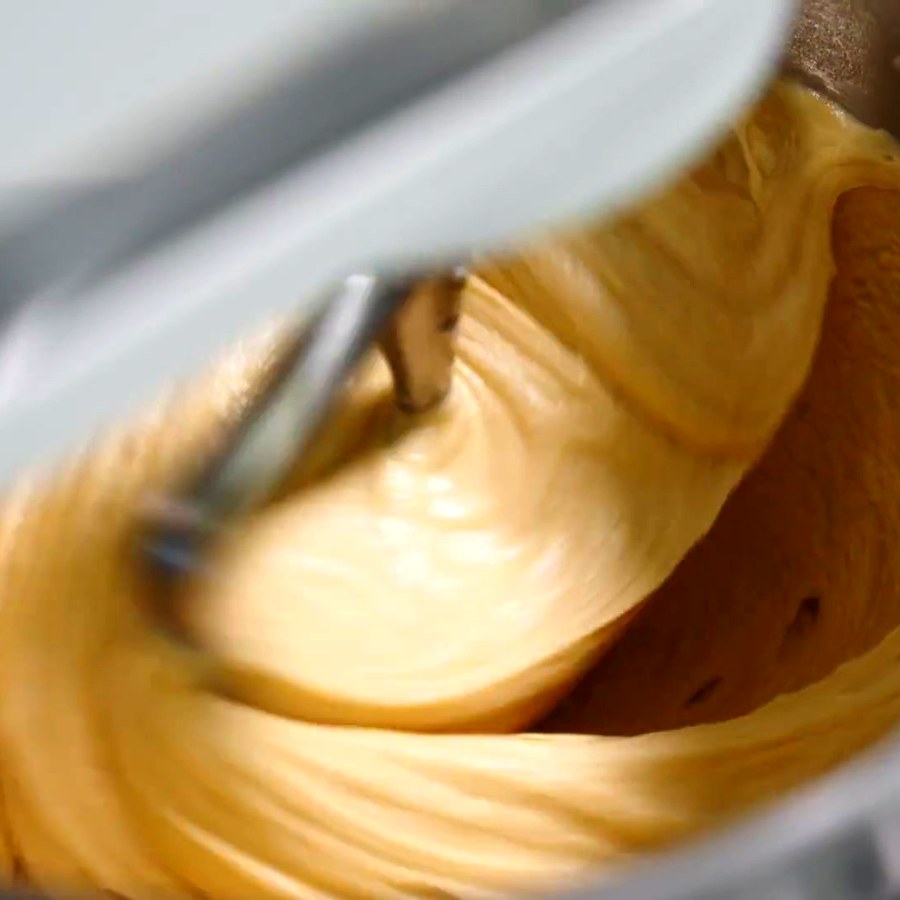 Fresh doughnut batter being mixed